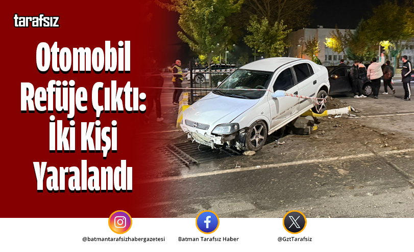 Otomobil Refüje Çıktı: İki Kişi Yaralandı